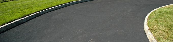 Close Up of Grass and Driveway