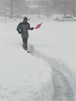 Person Shoveling Snow